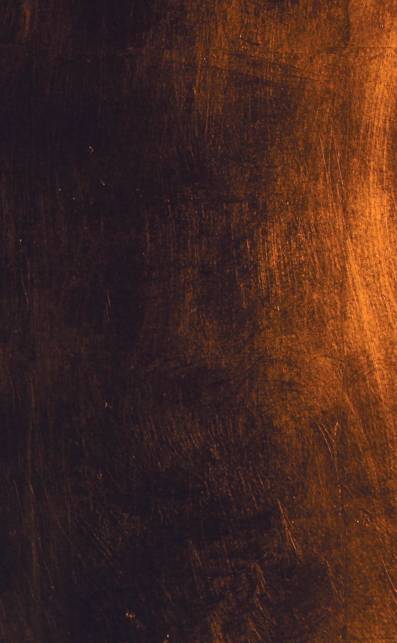 Ein braun-schwarzer Hintergrund mit einem Licht, das durch ihn strahlt.