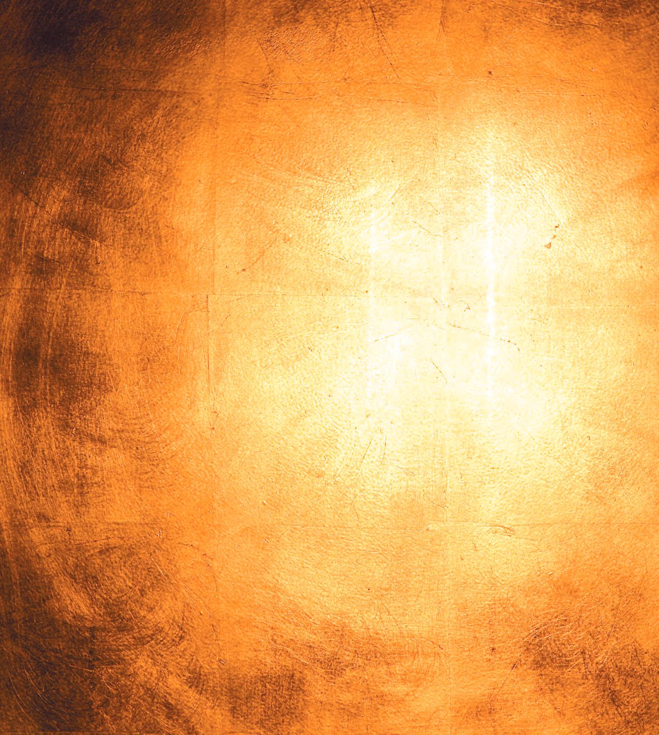Ein gelb-braunes Hintergrund mit einem Licht, das durch ihn strahlt.