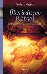 Ein Buchcover mit dem Titel "Uberirdische Ratsel" darauf.