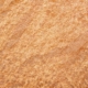Eine braune Oberfläche, die wie Sand aussieht.