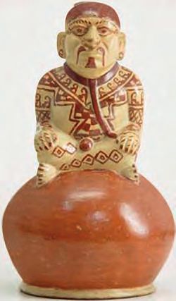 Eine keramische Statue eines Mannes mit einem großen Bauch.