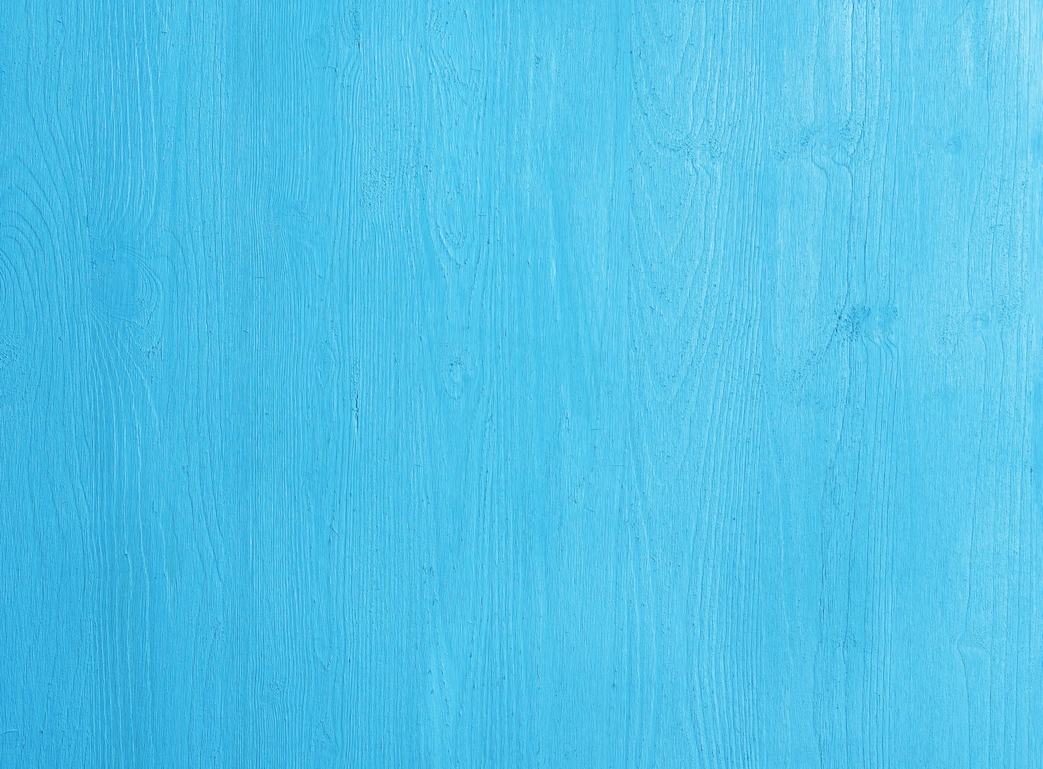 Ein blaues Holzkornmuster auf blauem Hintergrund.