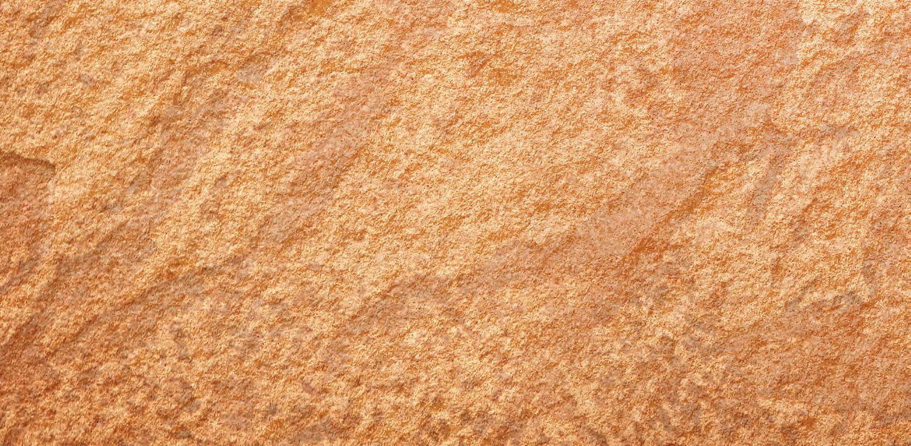 Eine braune Oberfläche, die wie Sand aussieht.