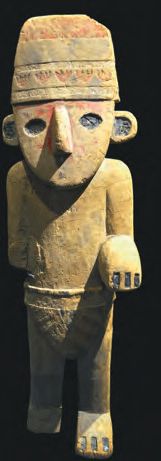 Eine Statue eines Mannes mit Hut und Handschuh.